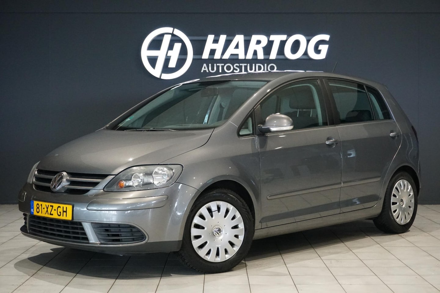 Volkswagen Golf Plus - 1.4 Optive 3 + PDC / CRUISE / AIRCO / TREKHAAK - AutoWereld.nl