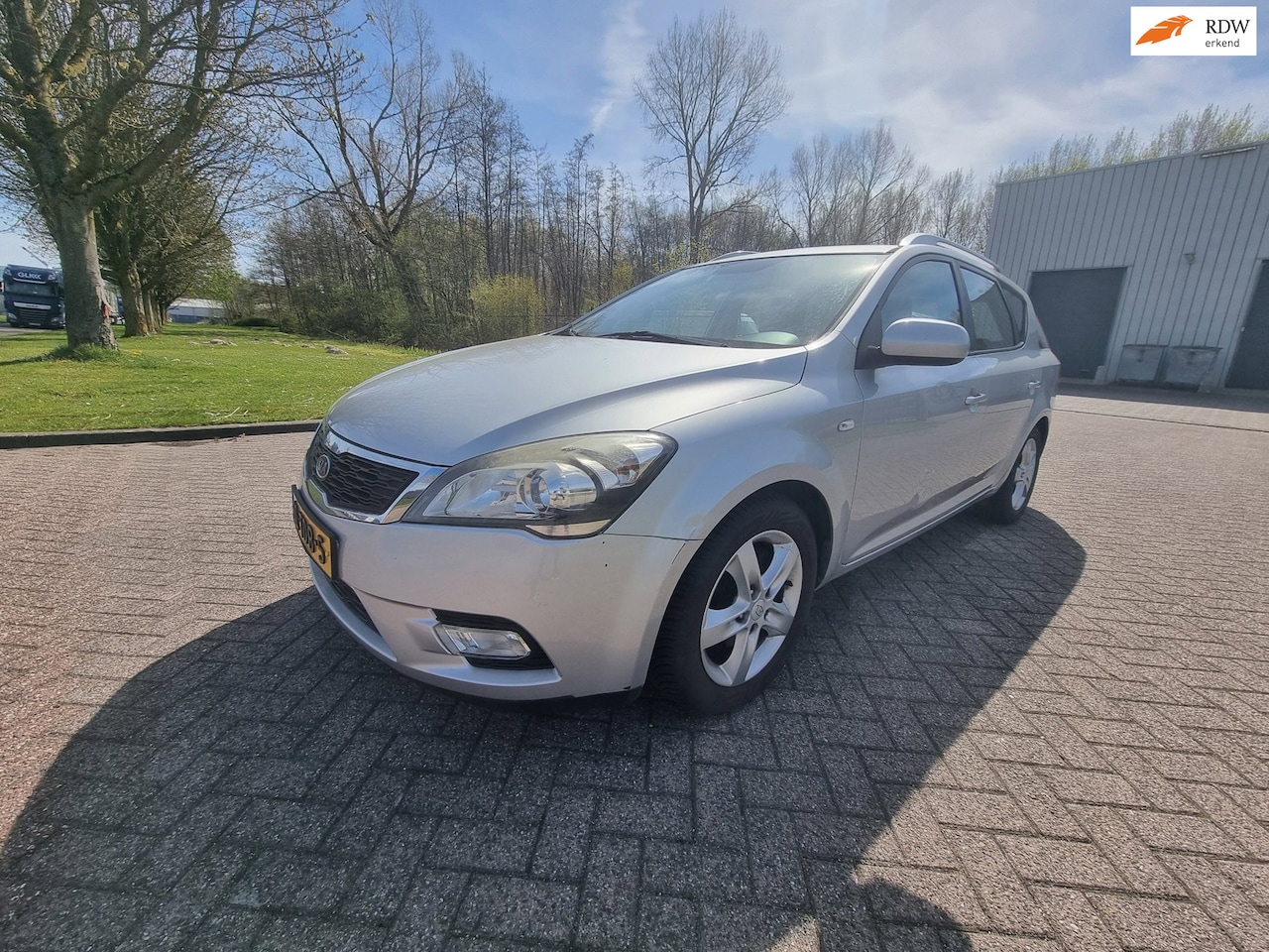 Kia Cee'd Sporty Wagon - 1.4 CVVT Navigator Plus Pack NAVI CRUISE CAMERA TREKHAAK AFNEEMBAAR - AutoWereld.nl
