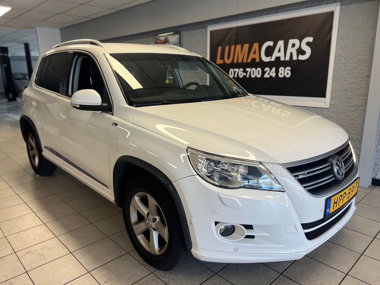 Volkswagen Tiguan - 2.0 TSI Sport&Style 4Motion R-line pakket - AutoWereld.nl