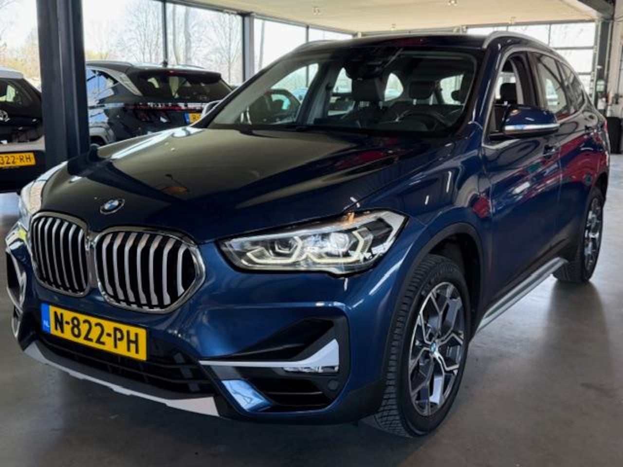 BMW X1 - (f48) sDrive20i 178pk Aut Orange Edition 12/2021 - AutoWereld.nl