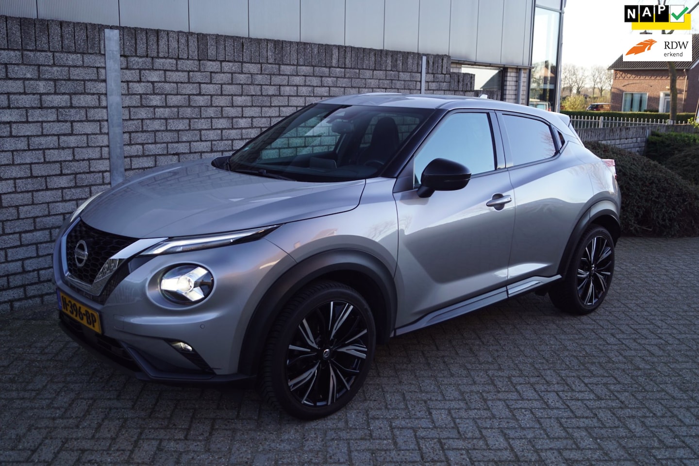 Nissan Juke - 1.0 DIG-T N-Connecta Navi Camera Clima Apple Carplay Cruise LED Kopl PDC LMV 19 Trekh ENZ - AutoWereld.nl