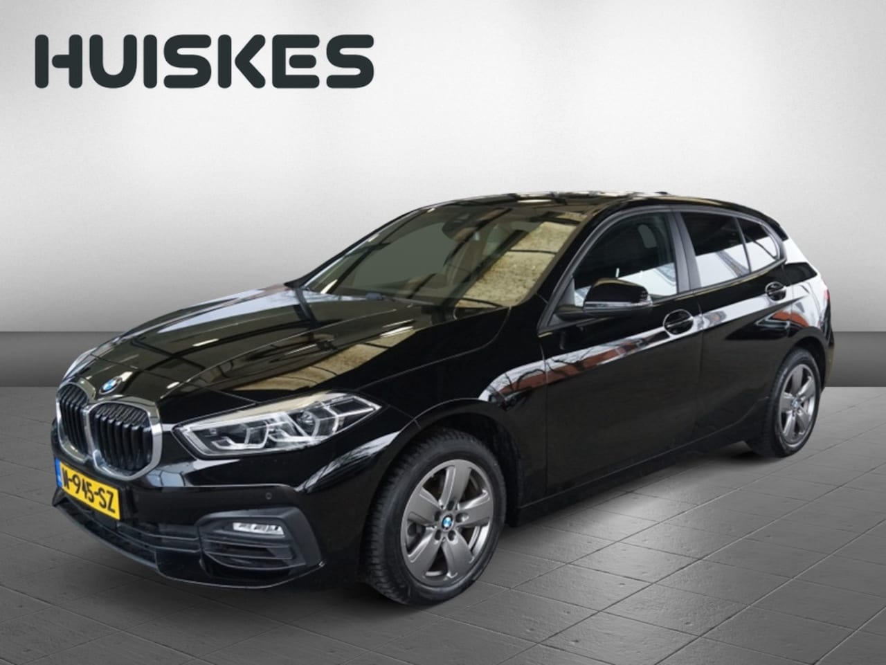BMW 1-serie - 116i Business Edition | Schuif-/kanteldak | Navigatie | Carplay - AutoWereld.nl
