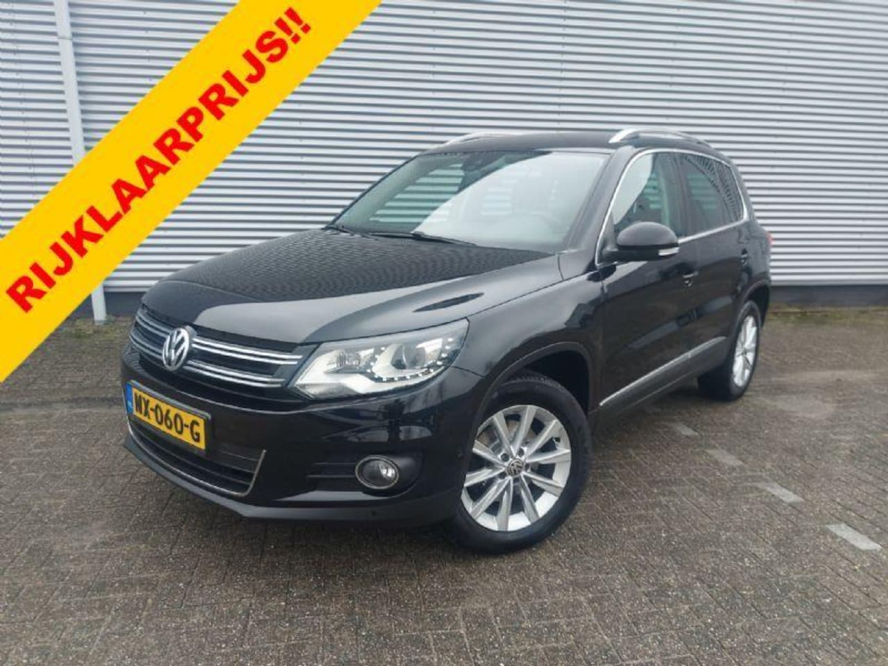 Volkswagen Tiguan - 1.4 TSI Sport&Style , airco,cruisecontrol,trekhaak,navigatie,stoelverwarming,parkeersensor - AutoWereld.nl