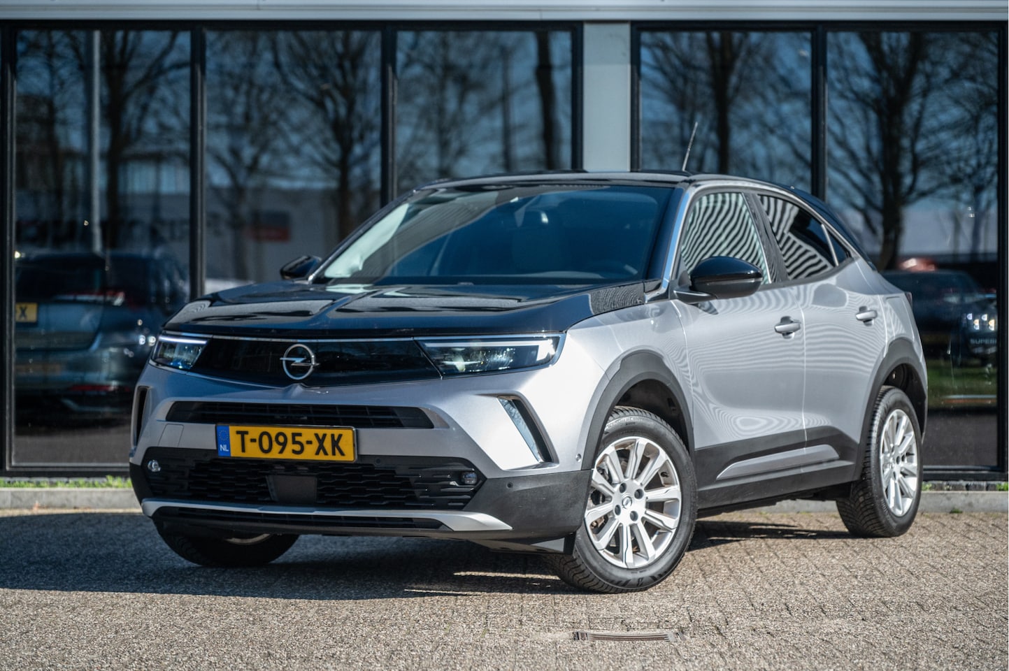 Opel Mokka-e - Elegance 50-kWh 11kw bl. | Navi | PDC V+A | Stoel- Stuurverw. | 93% SOH - AutoWereld.nl