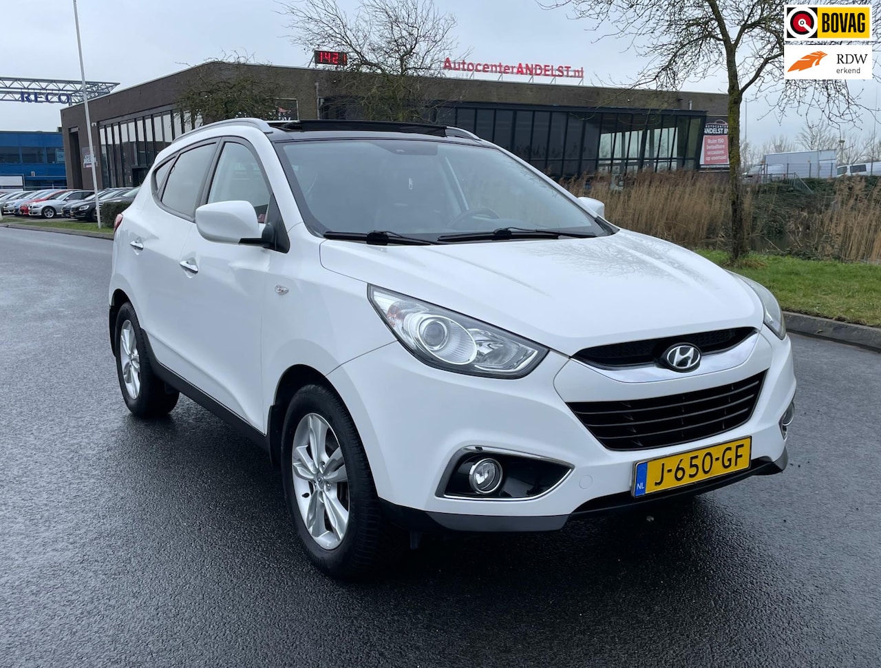 Hyundai ix35 - 2.0i 4WD Style 2.0i 4WD Style, Aut, Pano, Cam, Navi, Stoelverw, Leder, Climate/Cruise, Lmv, Pdc, Goed oh! - AutoWereld.nl