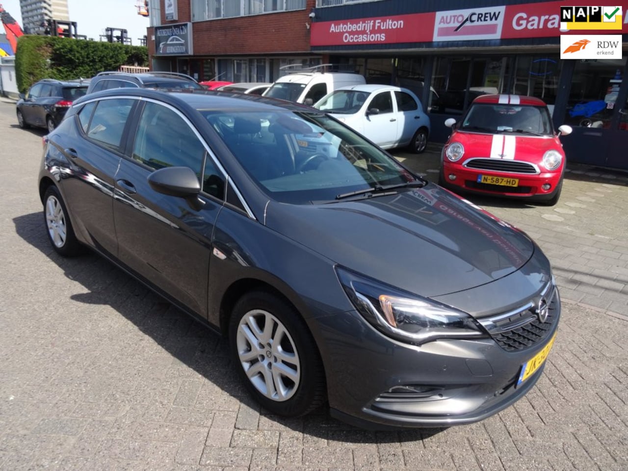 Opel Astra - 1.4 Business+/Navi/Cruise/PDC/LMV - AutoWereld.nl