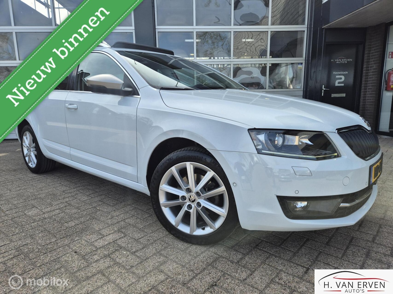 Skoda Octavia Combi - 1.4 SCHUIFKANTELDAK XENON PDC NAP NAVI - AutoWereld.nl