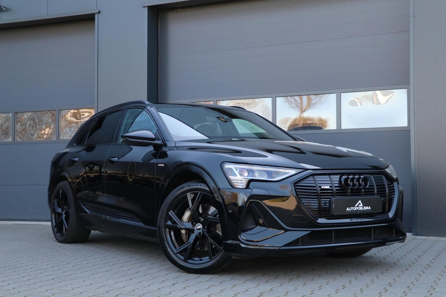 Audi e-tron - 55 quattro S edition 95 kWh AdaptiveCruise Luchtvering AppleCarplay LaneAssist MemoryZetel - AutoWereld.nl