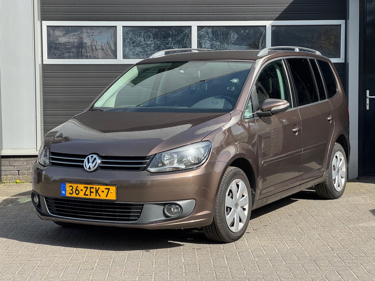 Volkswagen Touran - 1.2 TSI Comfortline BlueMotion 7p. BIJGELUID MOTOR - AutoWereld.nl