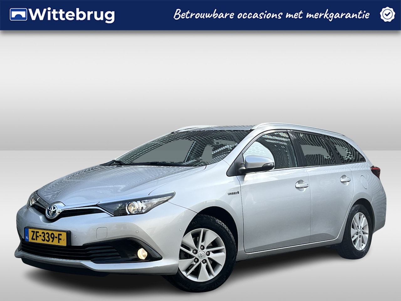Toyota Auris Touring Sports - 1.8 Hybrid Now / Navigatie / Camera / Parkeersensoren V+A / Climate controle / Cruise - AutoWereld.nl
