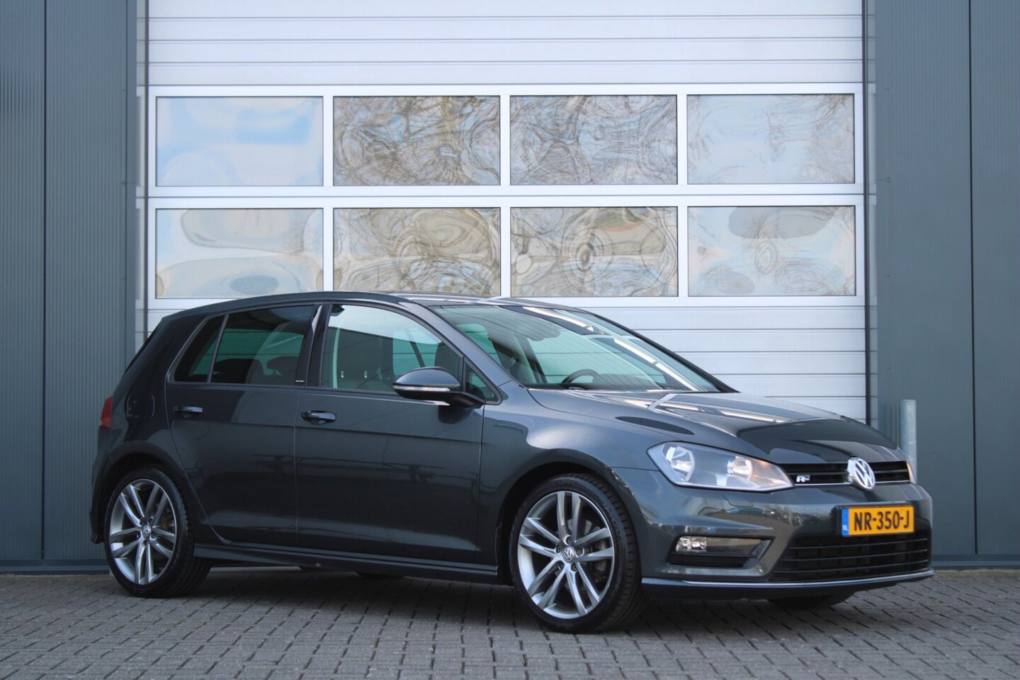 Volkswagen Golf - 1.4 TSI Highline R-Line Clima/Cruise/Stoelverwarming/PDCv+a/Navi/Bluetooth/18"LM/RadioCD.A - AutoWereld.nl