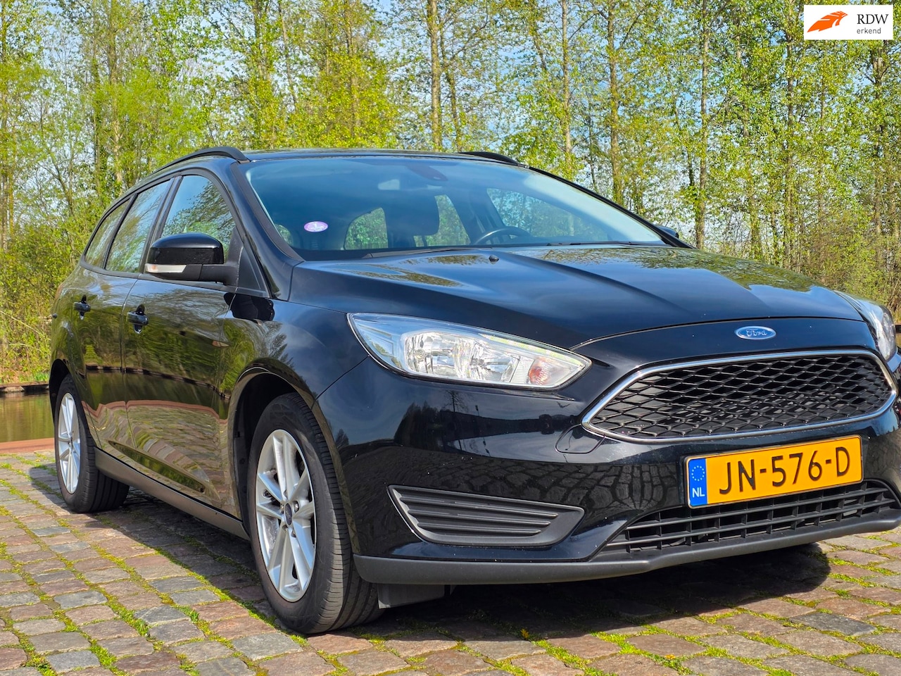 Ford Focus Wagon - 1.0 Trend 1e eigenaar dealer onderhouden cruis control parkeer sensor airco cv op afs elek - AutoWereld.nl