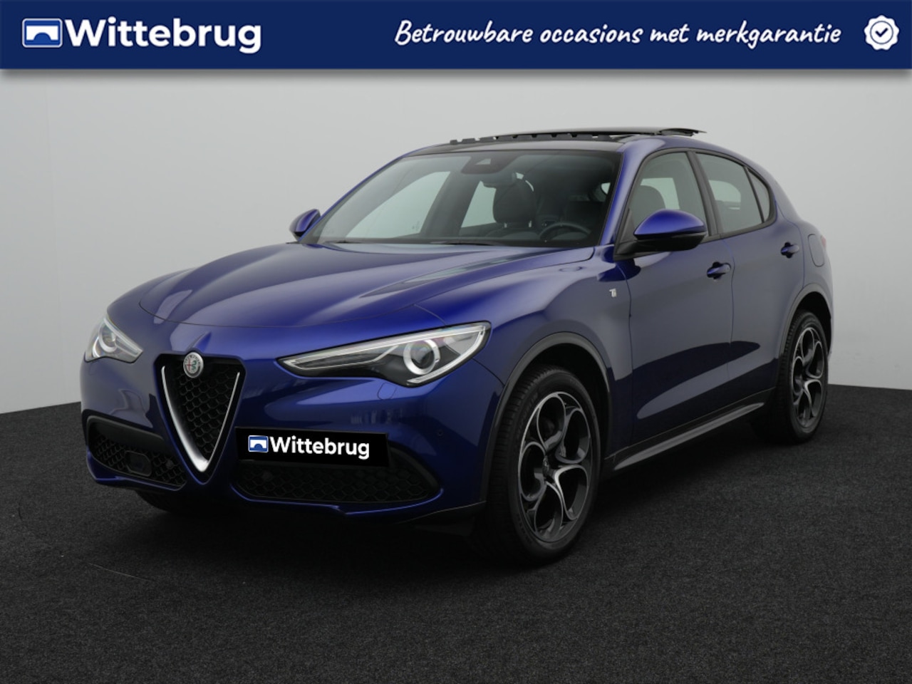 Alfa Romeo Stelvio - 2.0 T AWD Ti | Lederen bekleding | Panoramisch schuif/kanteldak - AutoWereld.nl