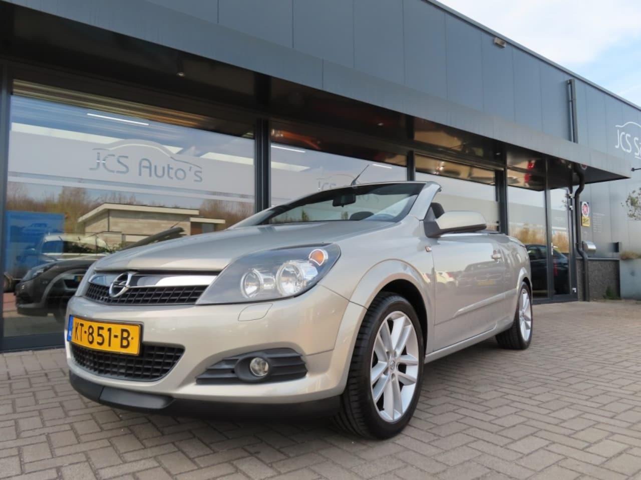 Opel Astra - 1.6 Cabrio Enjoy Airco Cruise Pdc 17 Inch 2006 - AutoWereld.nl