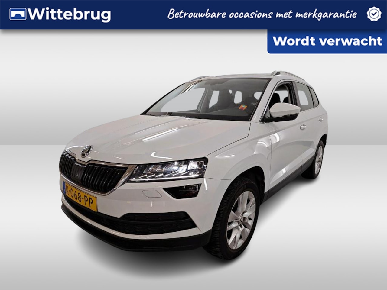 Skoda Karoq - 1.5 TSI ACT 150pk DSG Business Edition Plus / Panoramadak / LED / Navi / Camera / Cruise C - AutoWereld.nl