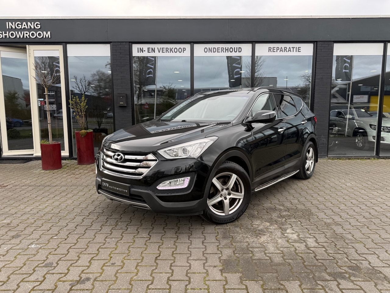 Hyundai Santa Fe - 2.4i GDI 4WD i-Catcher 7p. 2.4i GDI 4WD i-Catcher 7 persoon - AutoWereld.nl