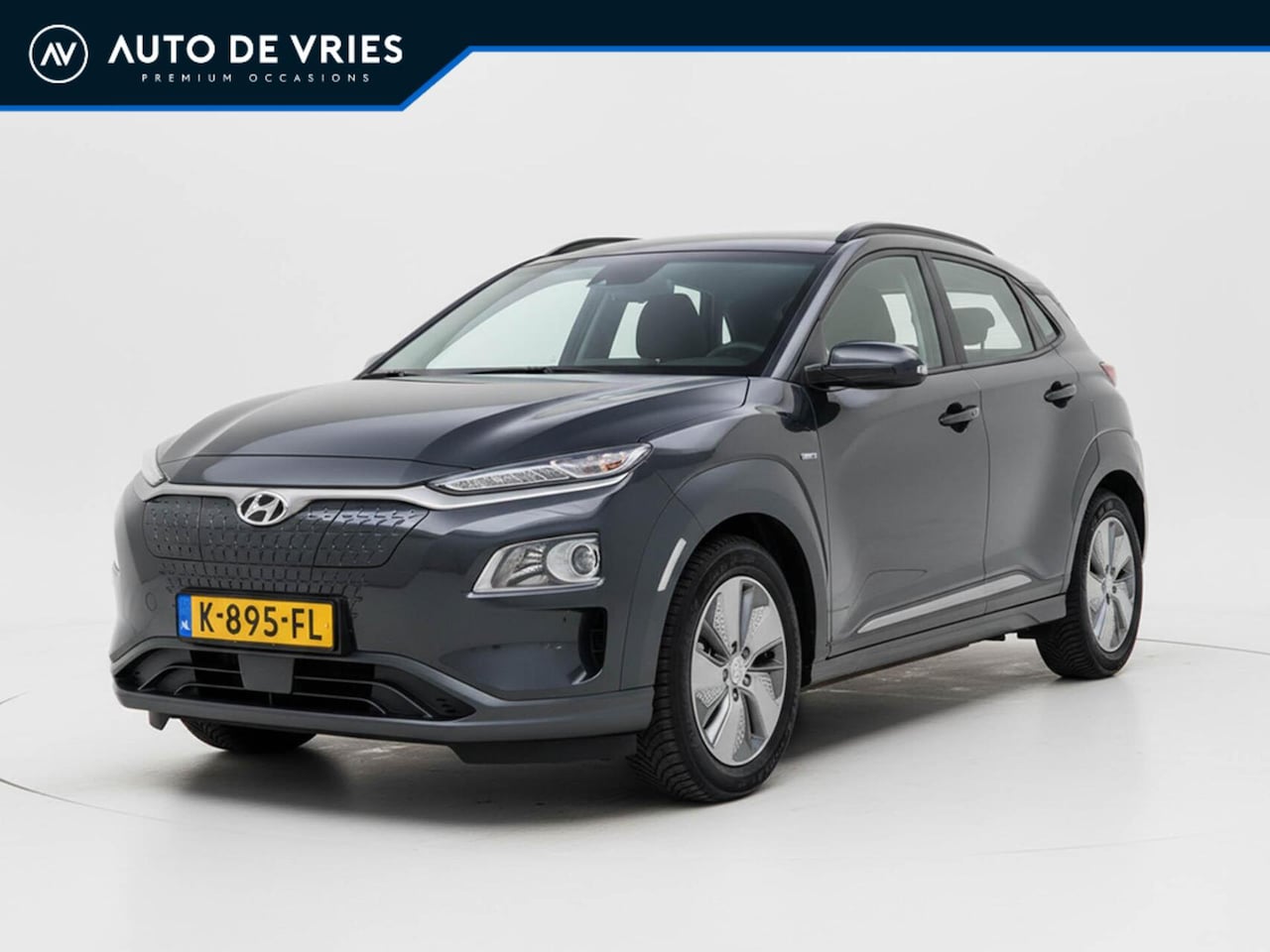 Hyundai Kona Electric - EV Comfort 64 kWh 3-Fase | SOH 100% | Carplay | Camera | Adaptive cruise - AutoWereld.nl
