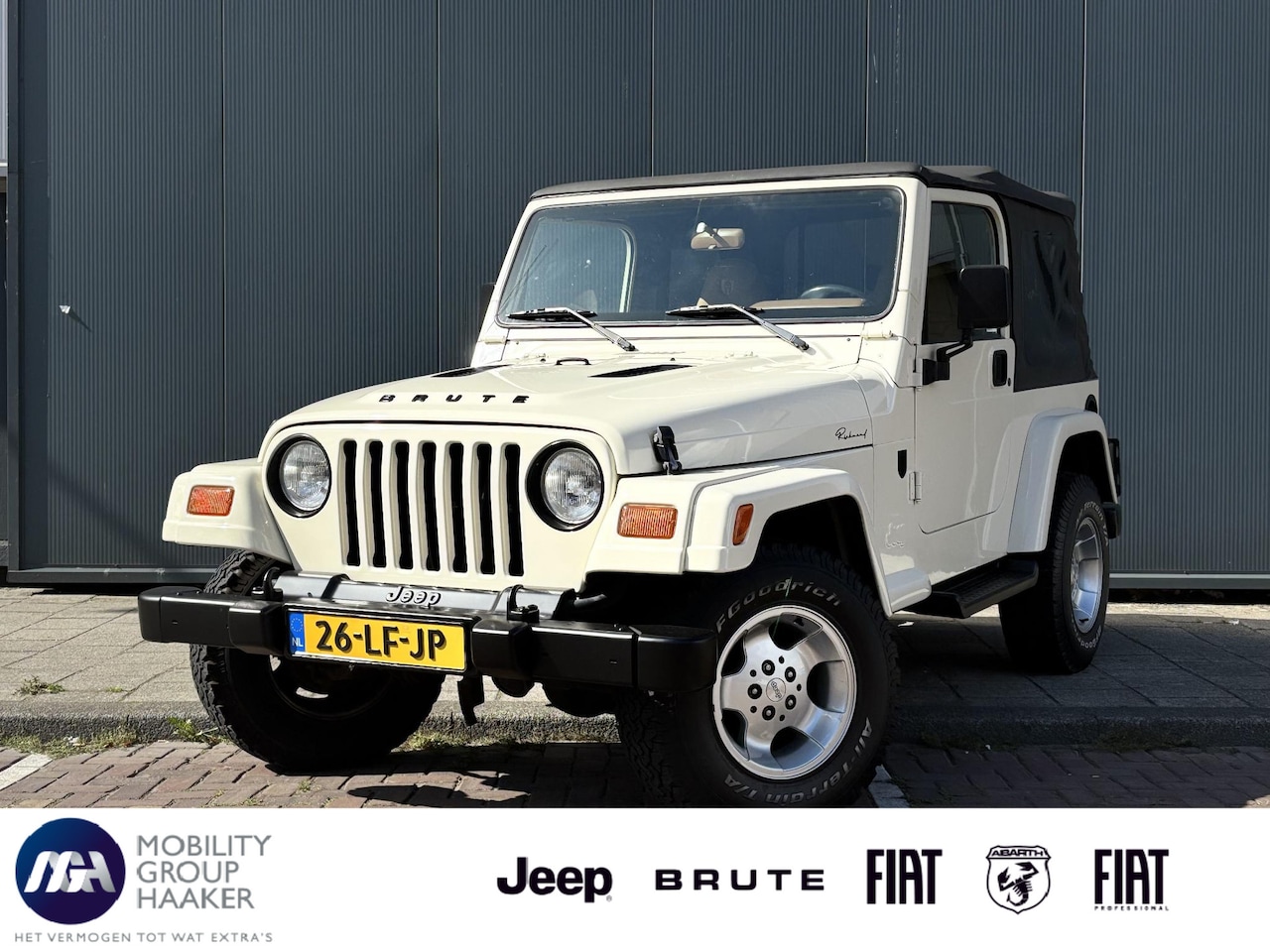 Jeep Wrangler - 4.0i Softtop BRUTE | Airco | Cruise Control | Unieke 1/1 - AutoWereld.nl