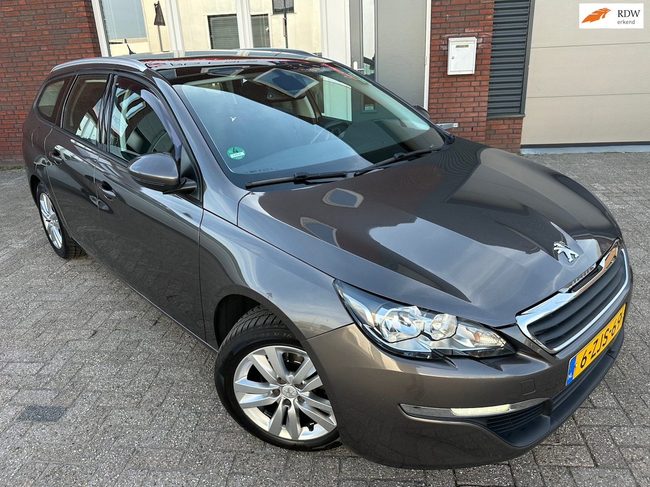 Peugeot 308 SW - 1.2 PureTech Active / Pano / Navi / PDC / Cruise / NAP - AutoWereld.nl