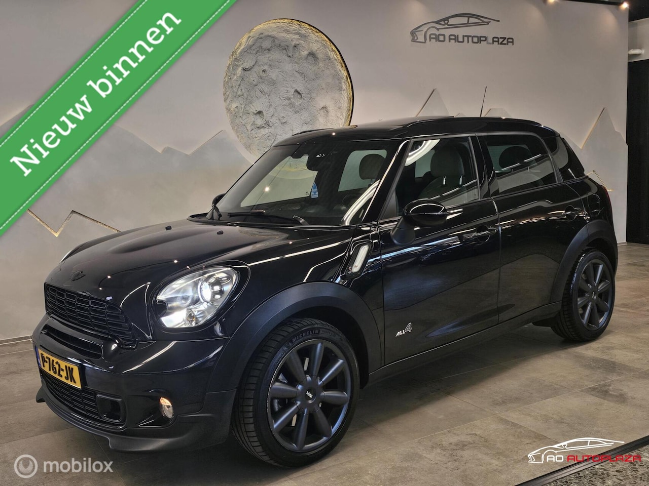 MINI Countryman - 1.6 Cooper S ALL4 Chili Panorama/Leder/Navigatie/Stoelverwarming - AutoWereld.nl