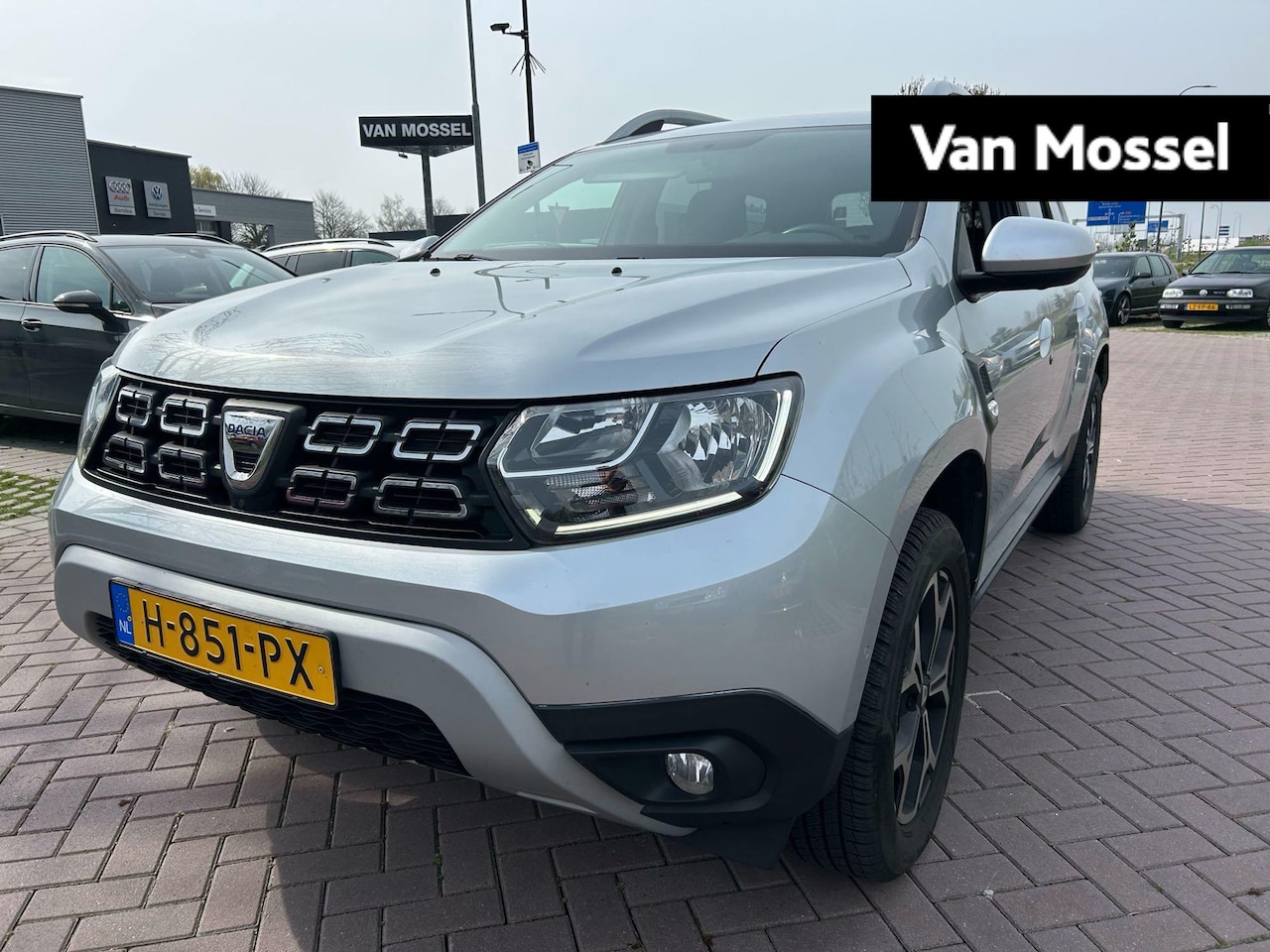 Dacia Duster - 1.3 TCe Prestige 150 PK | Trekhaak | Navigatie | Climate Control | Cruise Control | Achter - AutoWereld.nl