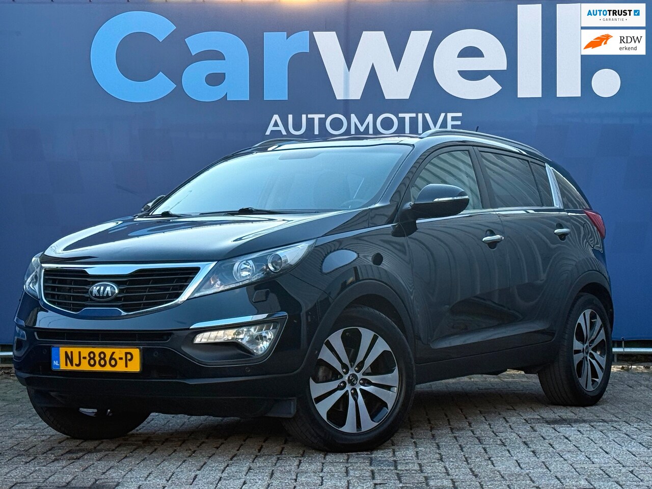 Kia Sportage - 2.0 Super Pack |1e Eigenaar|Trekhaak|Leder|STLvw|Pano|Navi|Cruise|Climate|PDC|Apk tot 15-0 - AutoWereld.nl