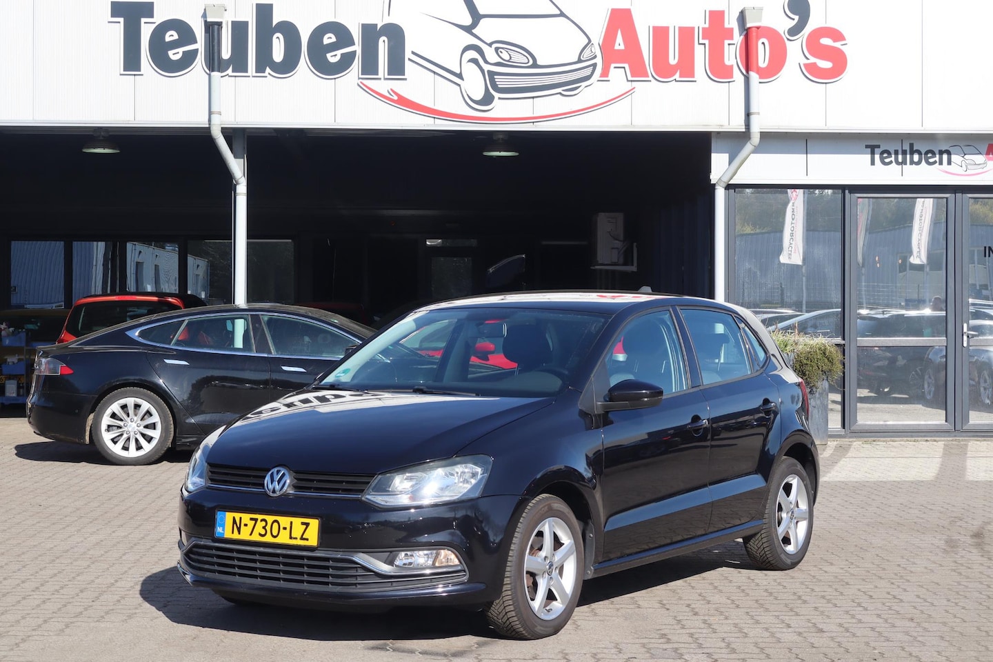 Volkswagen Polo - 1.2 TSI Comfortline | Airco | Cruise Control | Lichtmetalen velgen - AutoWereld.nl