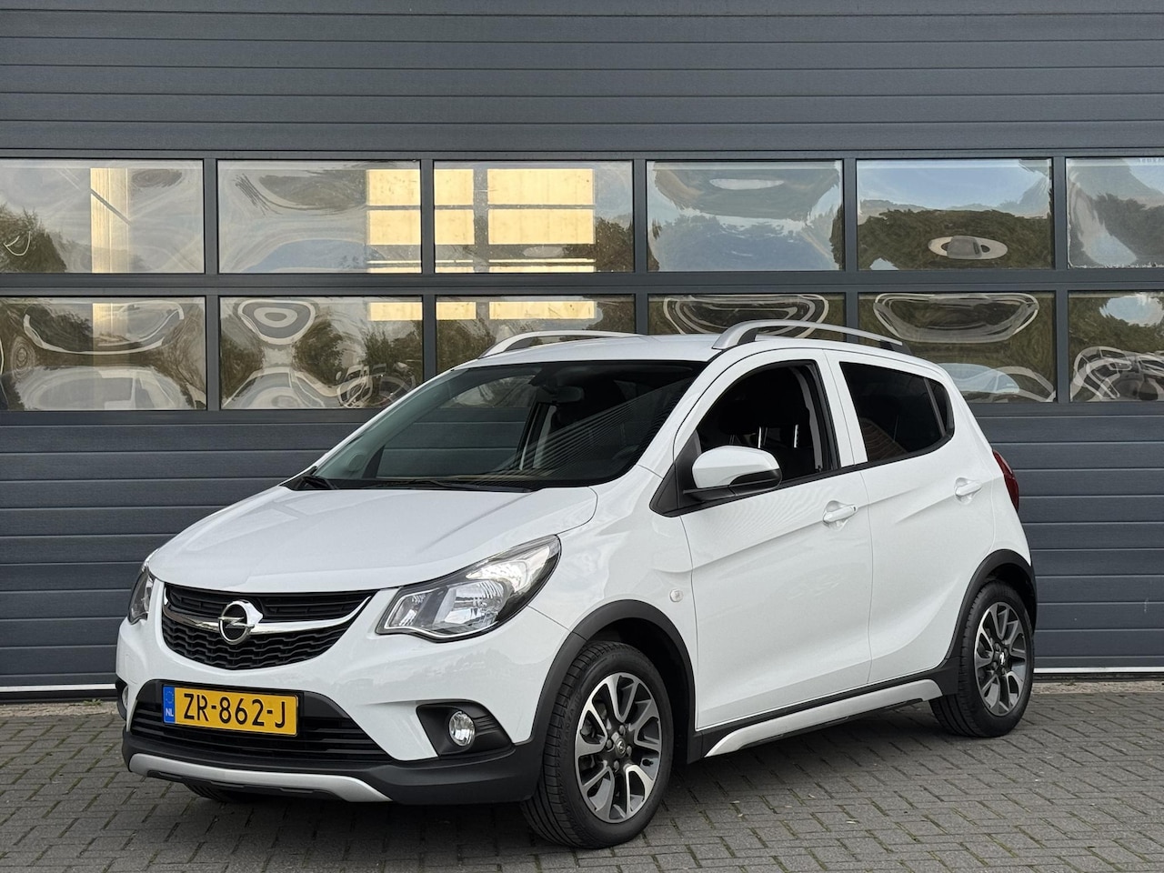 Opel Karl - 1.0 ROCKS ONLINE EDITION I APPLE CARPLAY I LICHT METALEN VELGEN I CRUISE CONTROL - AutoWereld.nl