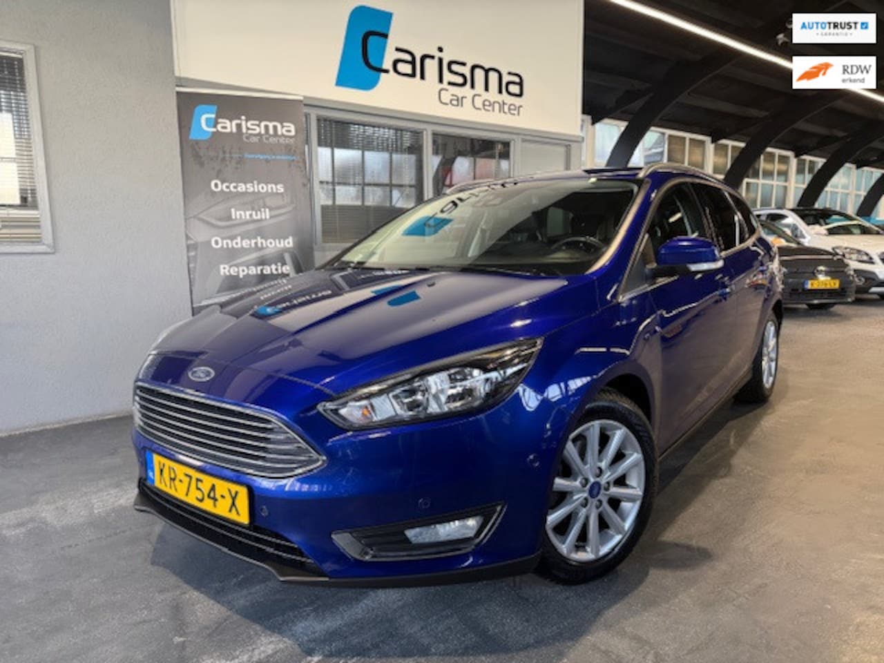 Ford Focus Wagon - 1.0 Titanium Navi|Cruise|Trekhaak - AutoWereld.nl
