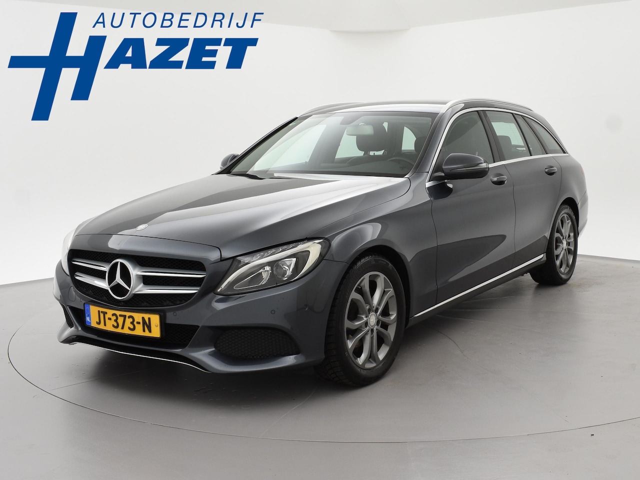 Mercedes-Benz C-klasse Estate - 180 AMBITION + LED | TREKHAAK | STOELVERWARMING | ELEKTR. KLEP | NAVIGATIE - AutoWereld.nl