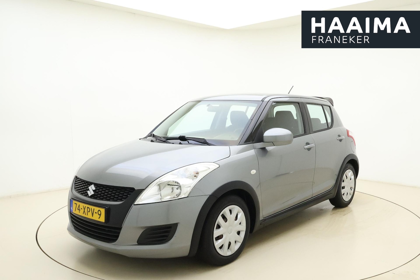 Suzuki Swift - 1.2 Summer EASSS 94pk | 5 Deurs | Weinig Kilometers! | Airco | Parkeersensoren achter | Ra - AutoWereld.nl