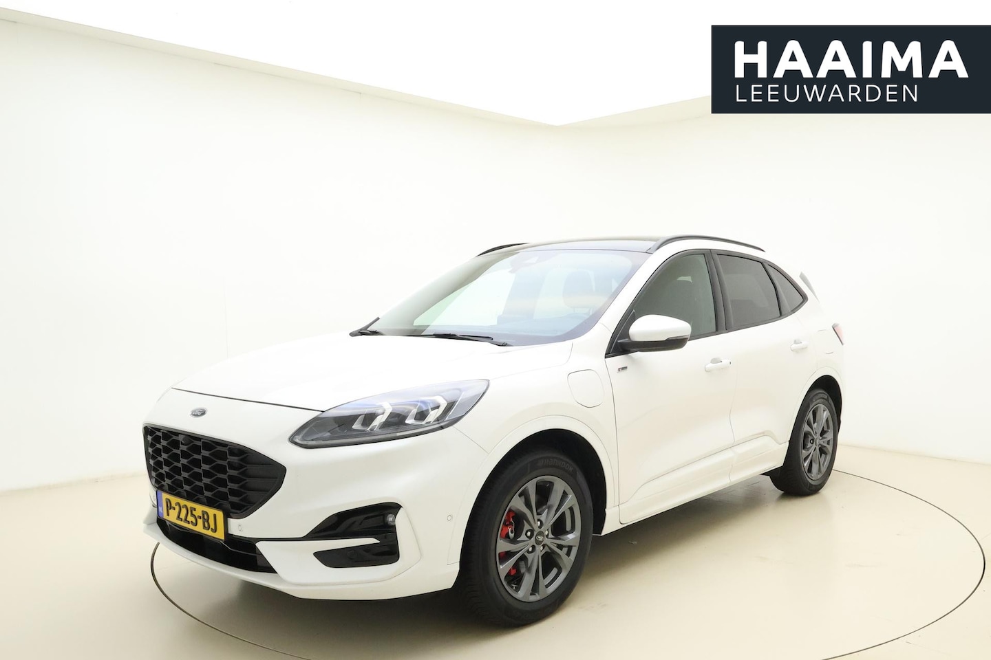 Ford Kuga - 2.5 PHEV Vignale 225 PK Automaat | Panoramisch schui/kanteldak | Leder Alcantara bekleding - AutoWereld.nl