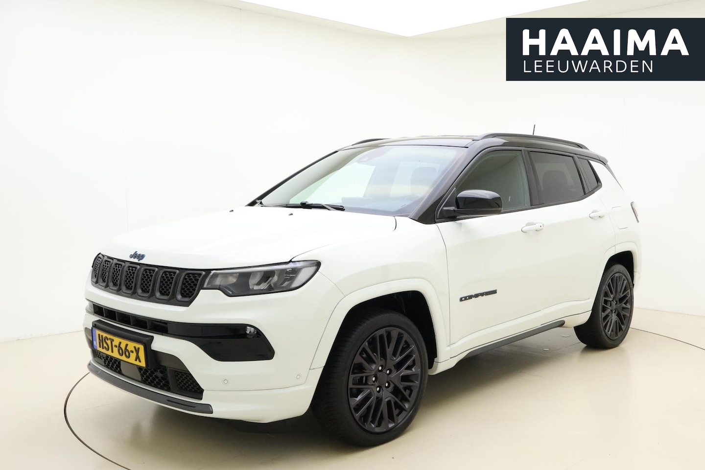 Jeep Compass - 4xe 240 Plug-in Hybrid Electric S Automaat | Navigatie | Lederen bekleding | Camera | Keyl - AutoWereld.nl