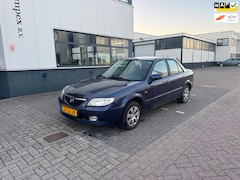 Mazda 323 - 1.6i Touring Airco Sedan