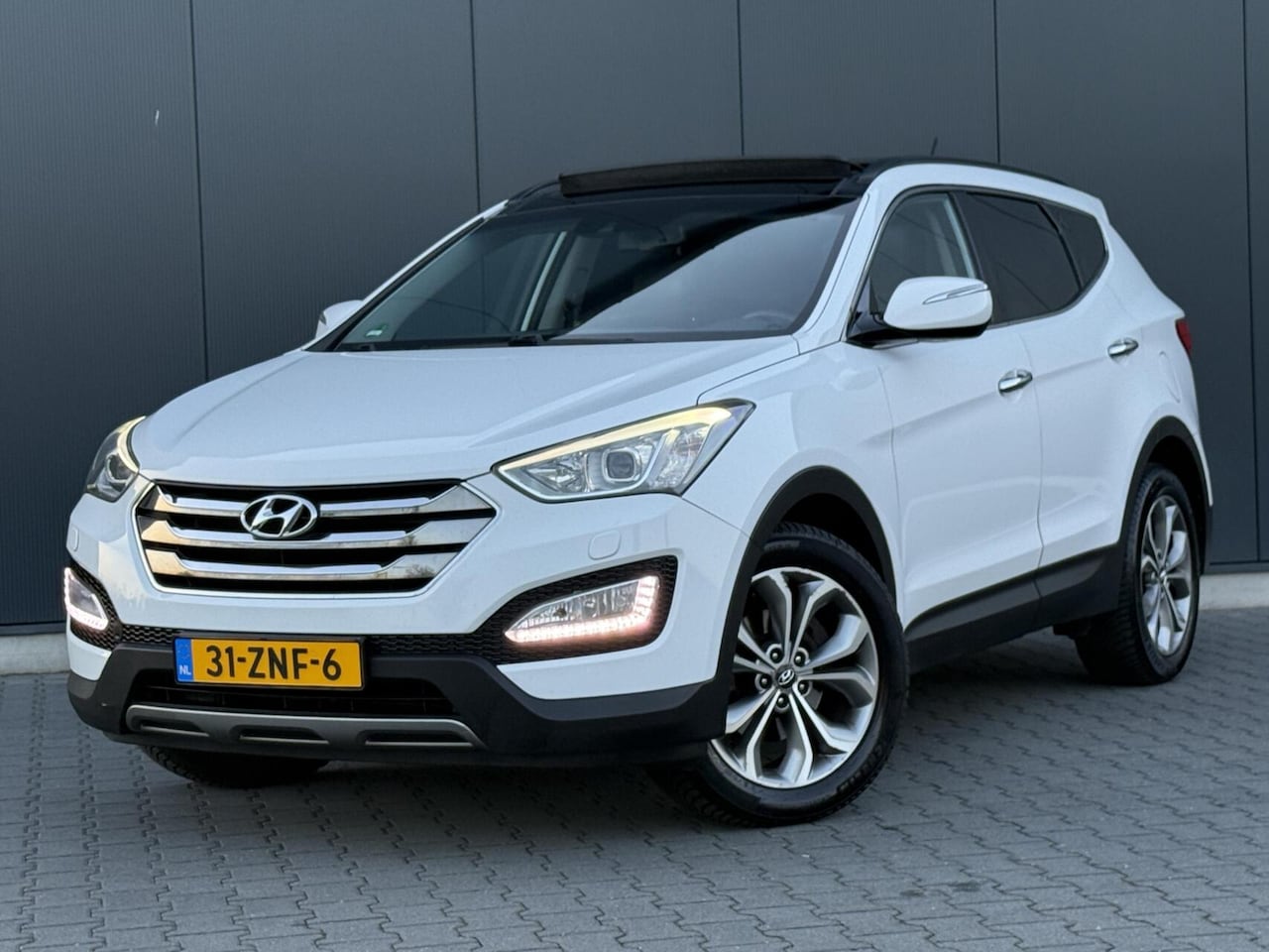 Hyundai Santa Fe - 2.4I GDI 4WD i-Catcher 7-Persoons - Pano - Leder - Dealer Onderhouden - AutoWereld.nl