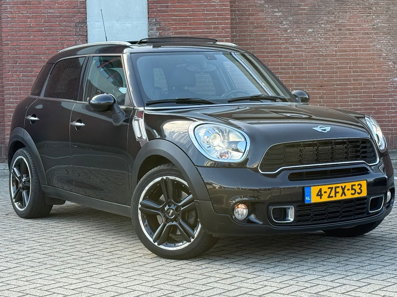 MINI Countryman - Mini 1.6 Cooper S ALL4 Chili|AUTOMAAT|PANO|LEDER|NAVI - AutoWereld.nl