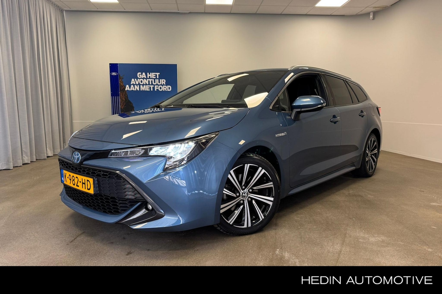 Toyota Corolla Touring Sports - 2.0 Hybrid Business Plus | Stoelverwarming | Car Play | Adaptive Cruise | Navi | Android A - AutoWereld.nl