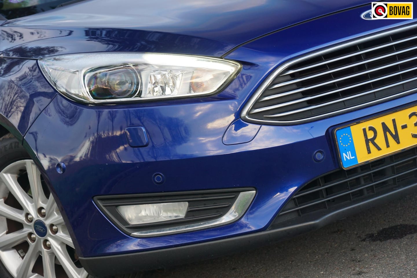 Ford Focus Wagon - 1.0 Titanium - Deep Impact Blue - Xenon/Winterpakket/Carplay - AutoWereld.nl