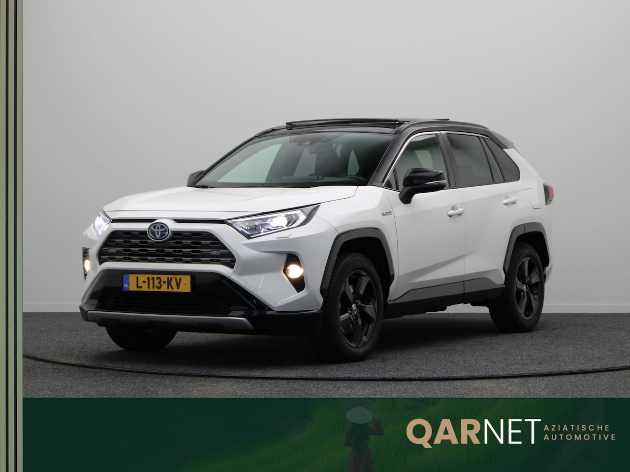 Toyota RAV4 - 2.5 Hybrid Bi-Tone | Panoramadak | Stuur, Stoel, en Voorruitverwarming | Trekhaak | - AutoWereld.nl