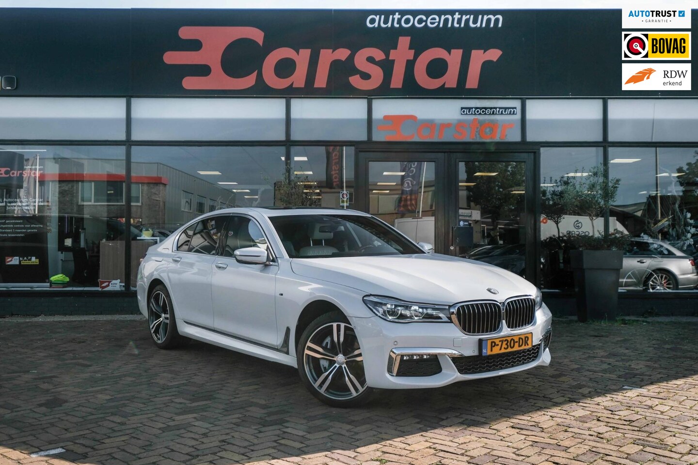 BMW 7-serie - 730d xDrive High Executive|Leer|Dak|MMI|Camera - AutoWereld.nl
