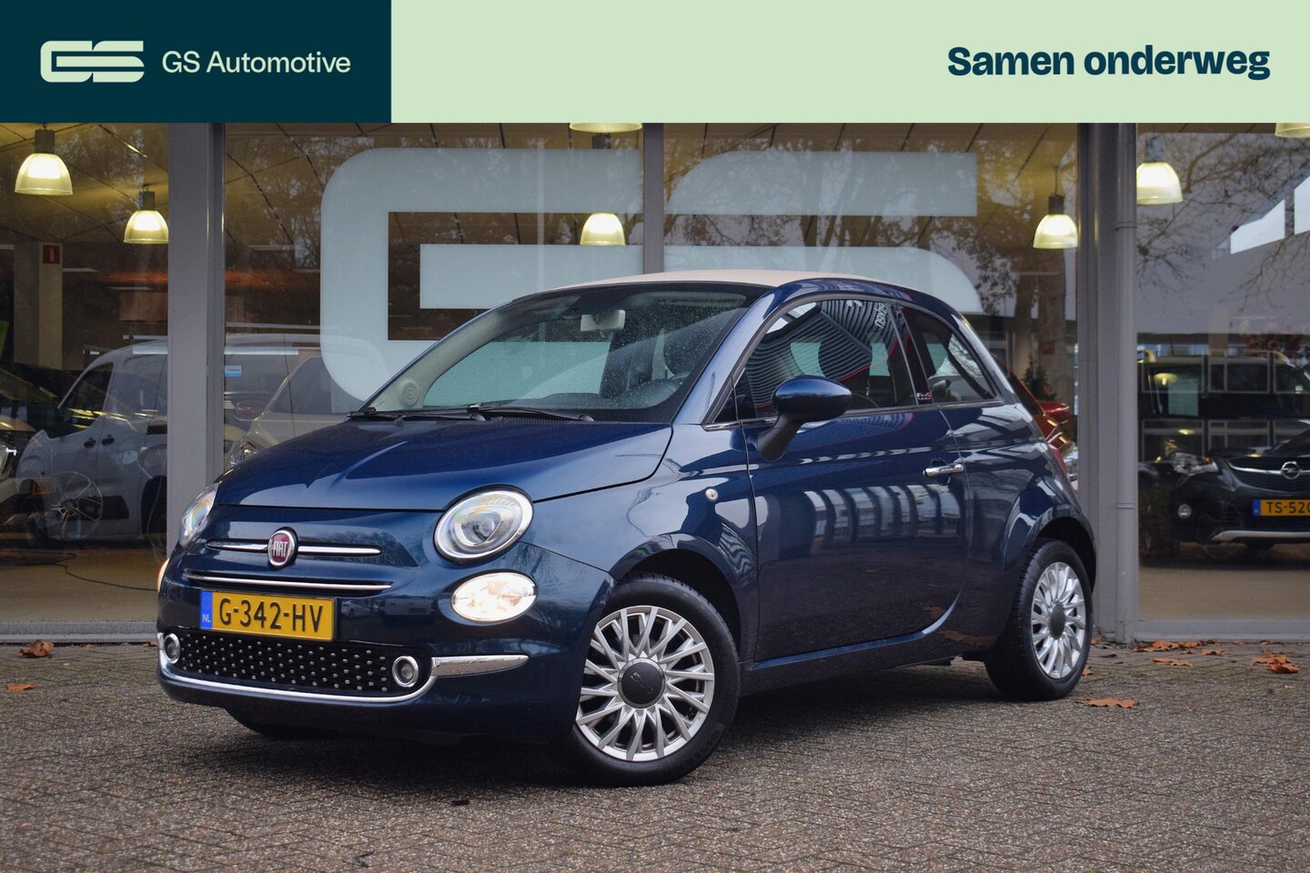 Fiat 500 C - 0.9 TwinAir Turbo Lounge NAV|AC|GR.SCHERM|CRUISE - AutoWereld.nl