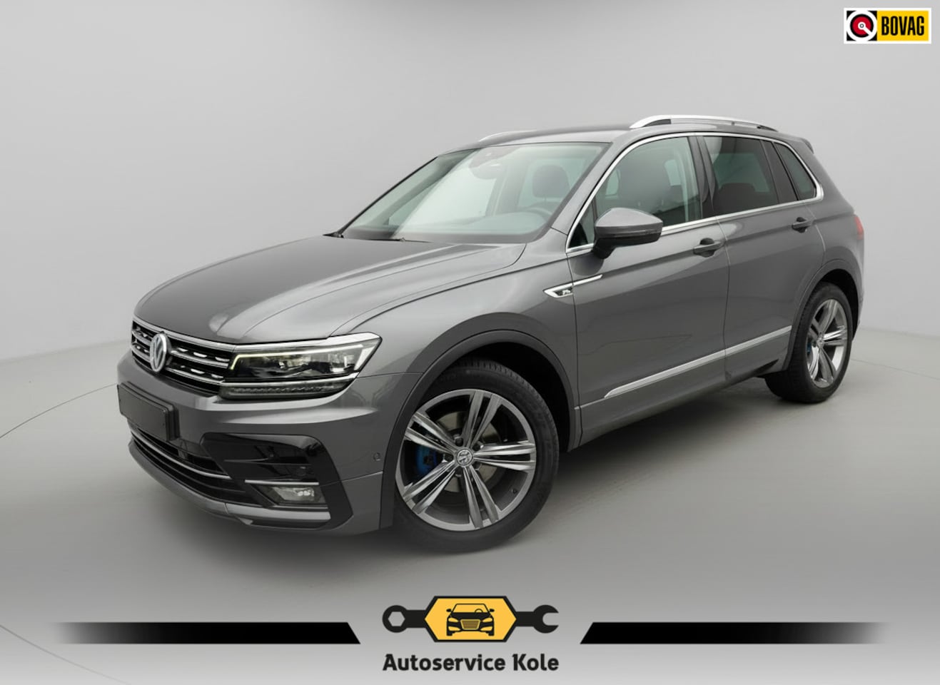 Volkswagen Tiguan - 1.4 TSI Automaat R-Line * Led Plus * Camera * Stoelverwarming * Adaptieve Cruise Control * - AutoWereld.nl