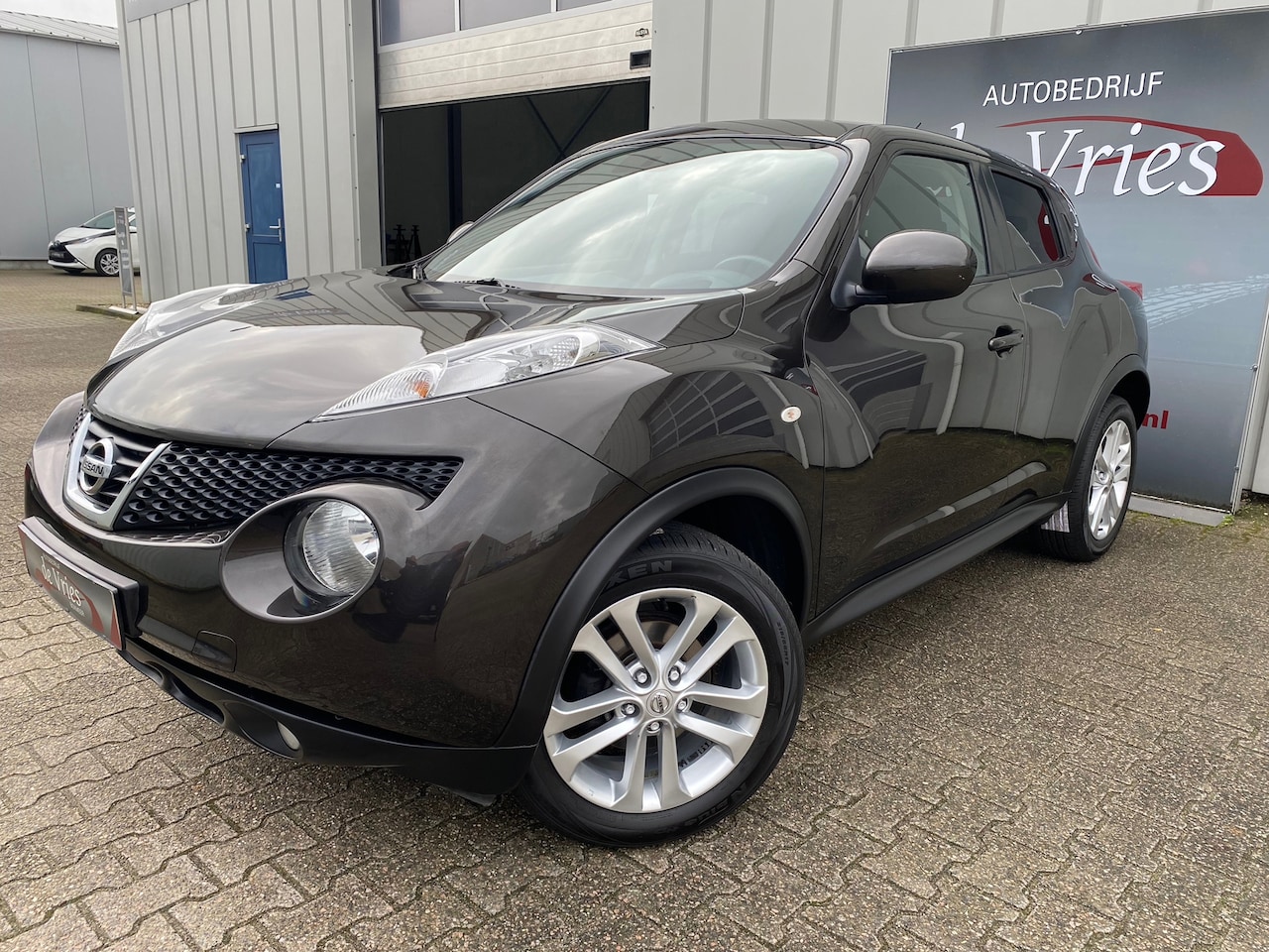Nissan Juke - 1.6 Tekna / Clima / Cruise / Navi / Camera / LMV - AutoWereld.nl