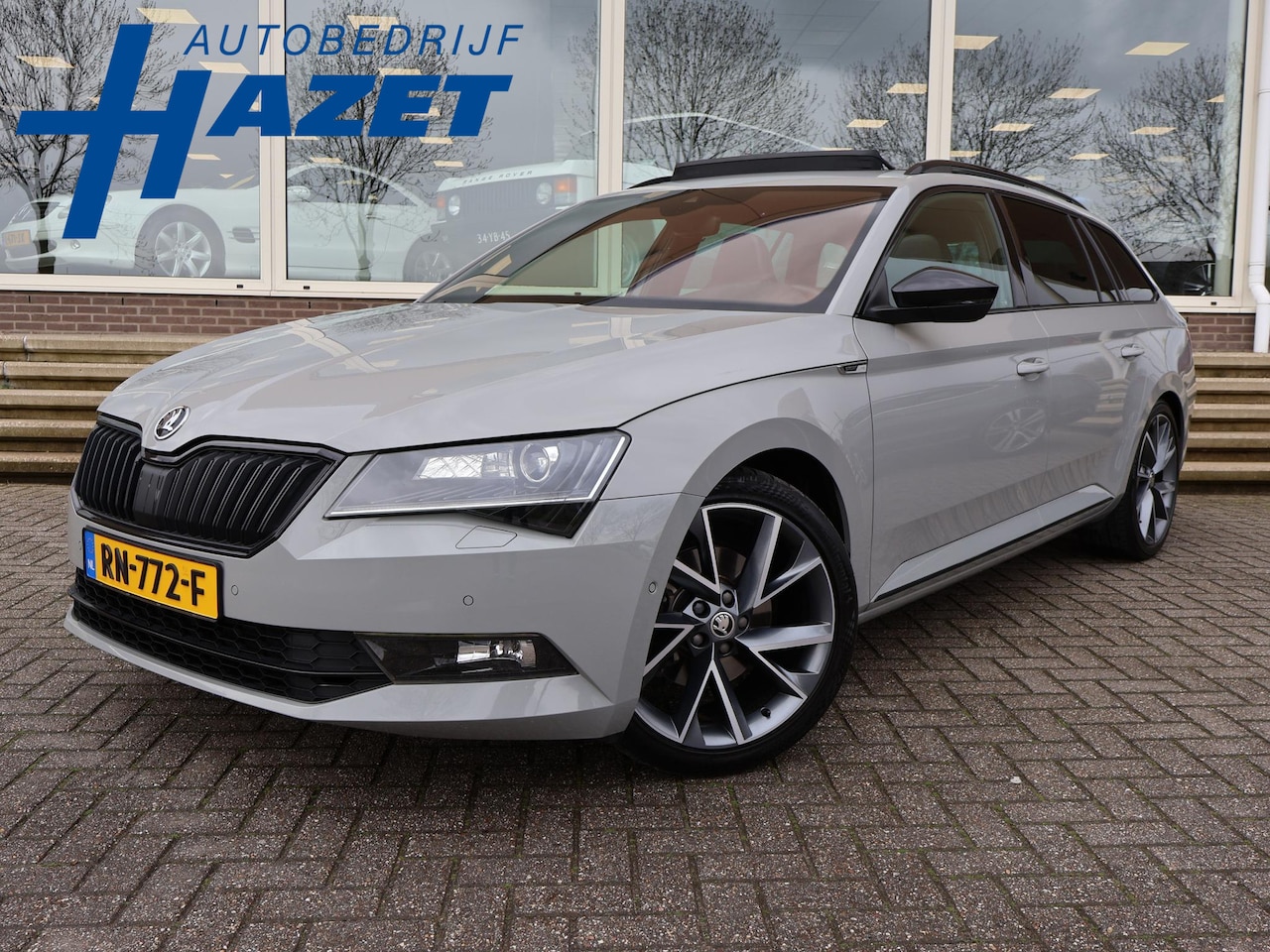 Skoda Superb Combi - 1.4 TSI ACT 150 PK SPORTLINE DSG AUT. *STEEL GREY* + WEGKL. TREKHAAK | PANORAMA | 19 INCH - AutoWereld.nl