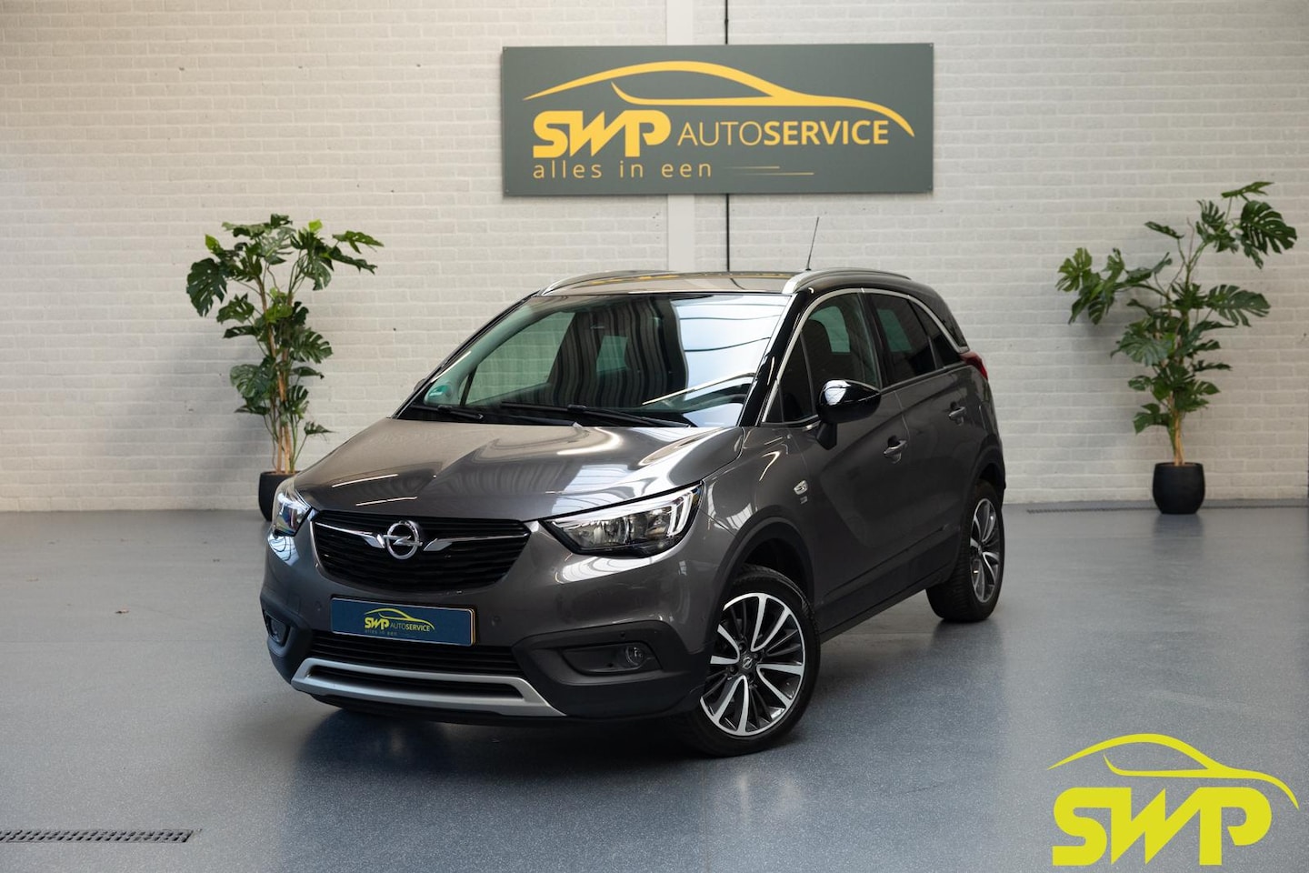 Opel Crossland X - 1.2 Turbo 120 Jaar Edition | Navi | Camera | PDC | Bi-tone | Dodehoek | 17 inch - AutoWereld.nl
