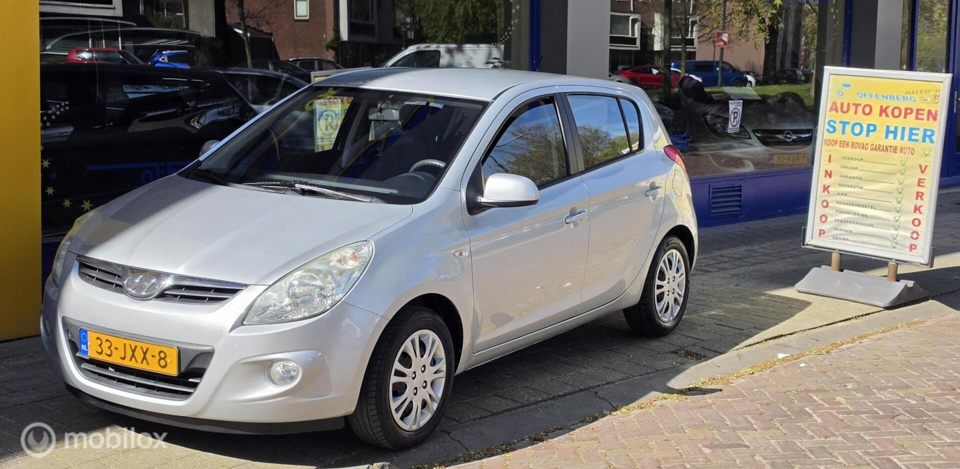 Hyundai i20 - 1.4i DynamicVersion Airco Navi Originele KM - AutoWereld.nl