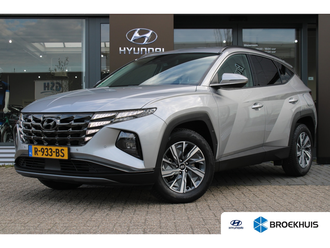 Hyundai Tucson - 1.6 T-GDI HEV Comfort Smart | Achteruitrijcamera | Afneembare Trekhaak | DAB ontvanger - AutoWereld.nl