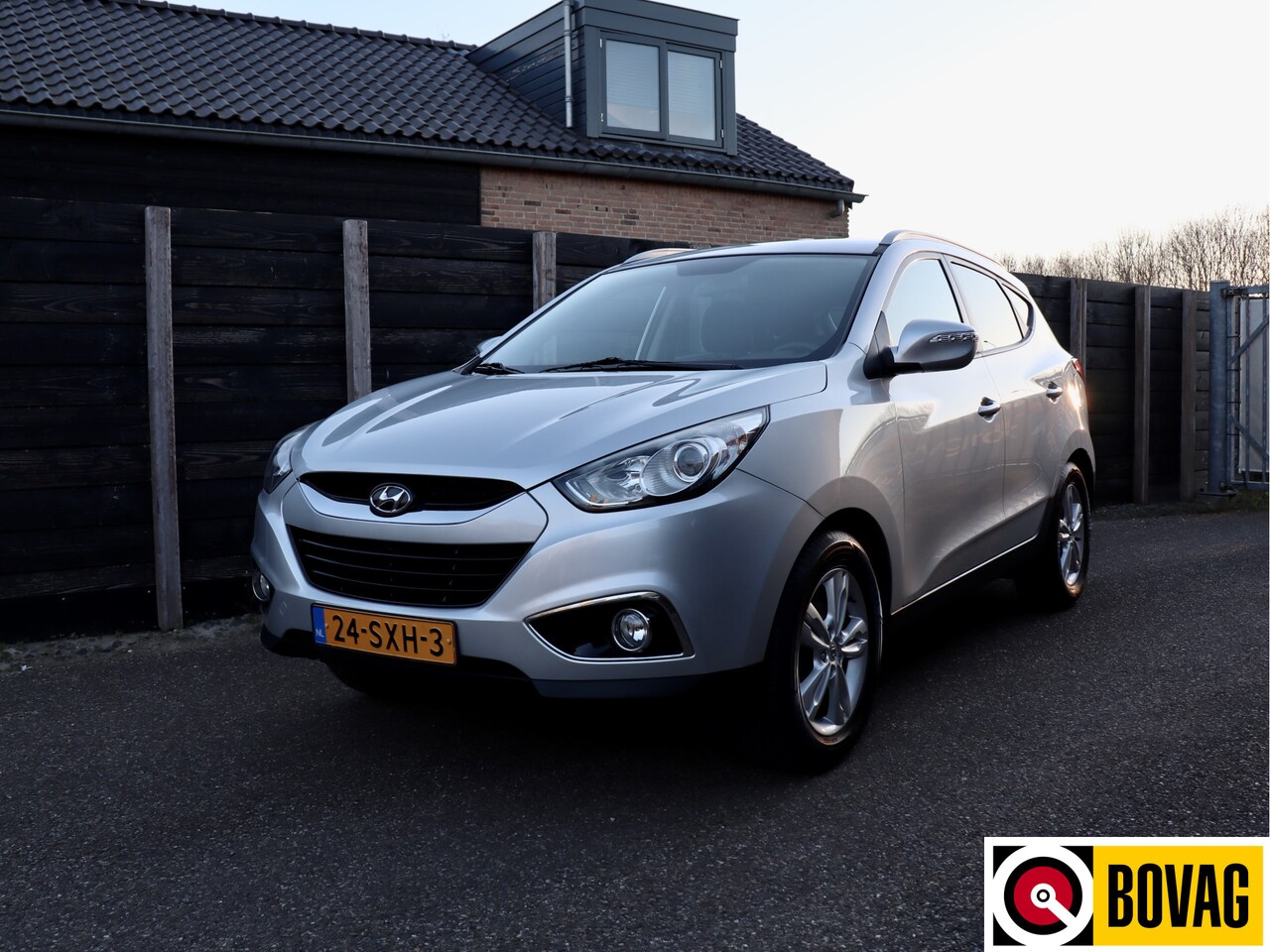 Hyundai ix35 - 1.6i GDI Business Edition cruise, clima, navi - AutoWereld.nl
