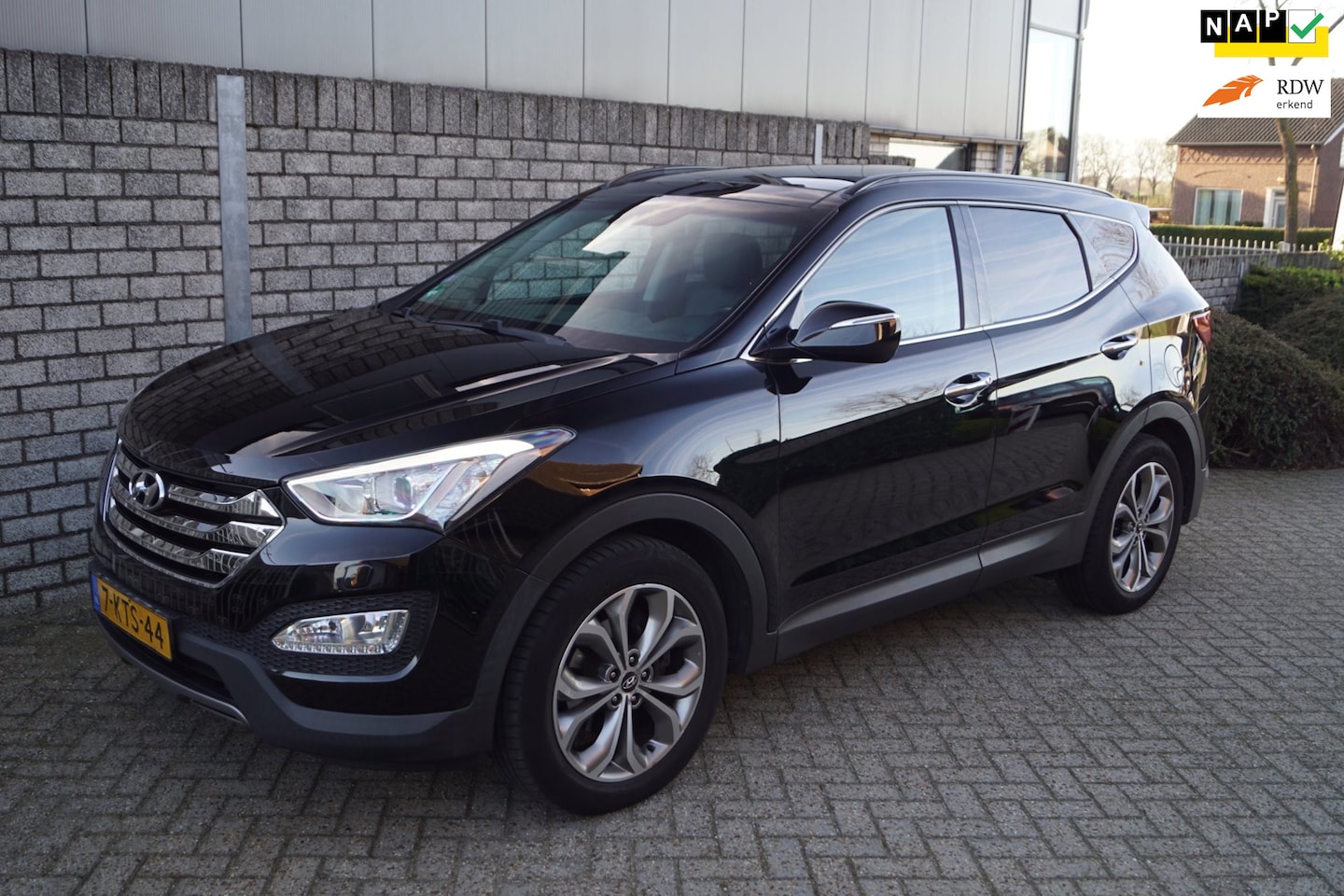 Hyundai Santa Fe - 2.4i GDI 4WD i-Catcher Autom Panodak Leder Stoel/Abank Verw Navi Camera Xenon Clima Cruise - AutoWereld.nl