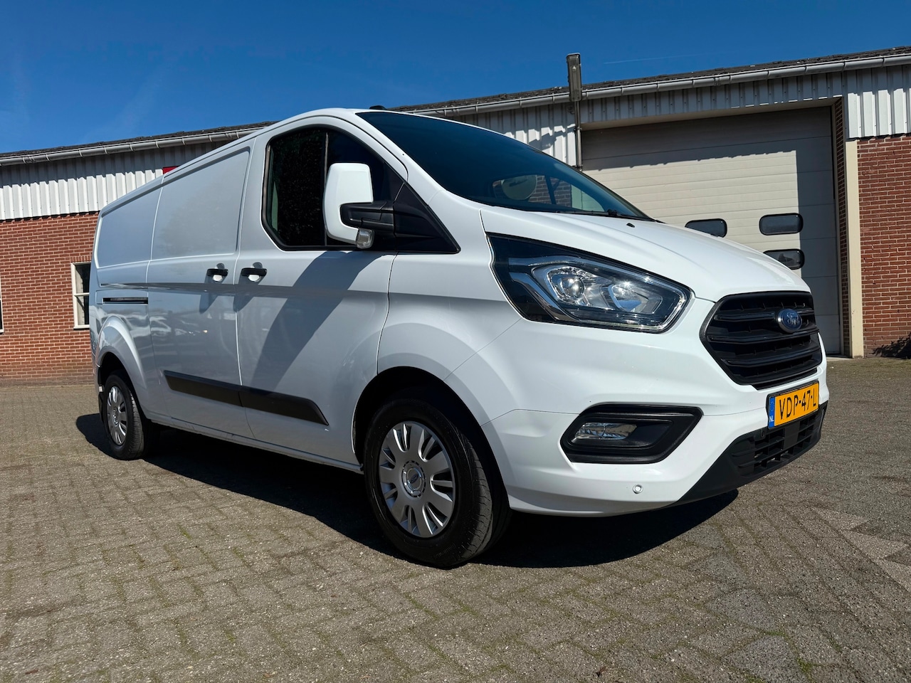 Ford Transit Custom - 340 2.0 TDCI L2H1 Trend CarPlay navi stoelverwarming airco cruise - AutoWereld.nl